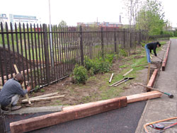 Edging the area with railway sleepers